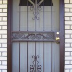 Brown Security Door With Scroll Center Panel